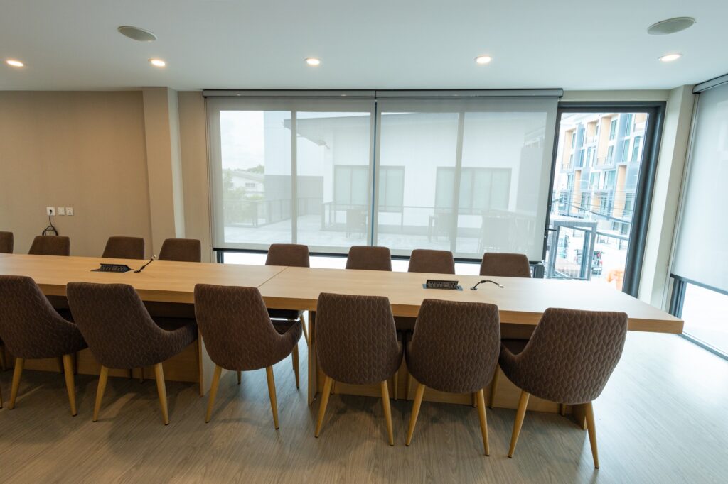 Modern Conference Room with Long Table and Chairs